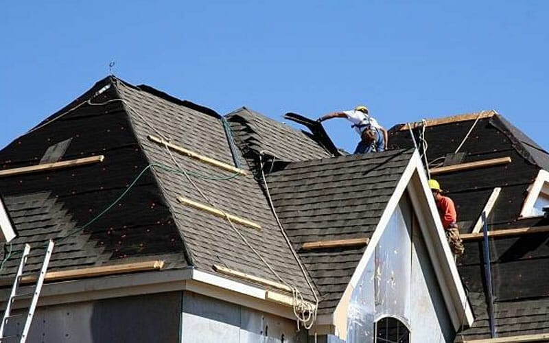 expert roofing contractors doing Roof replacement on Wichita's residential roof